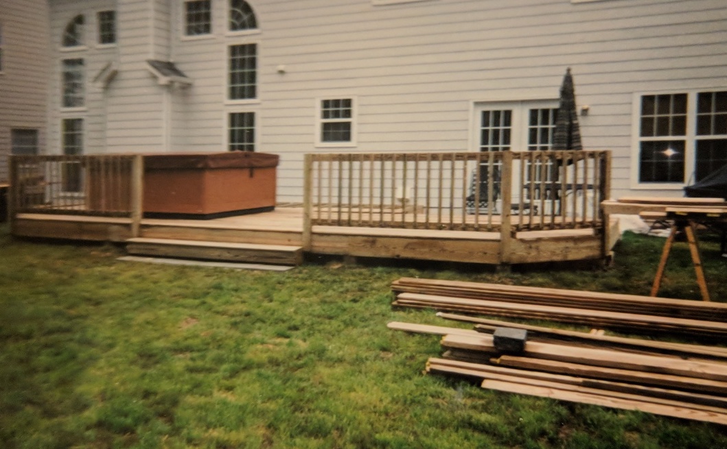 a newly-built deck with wooden slats