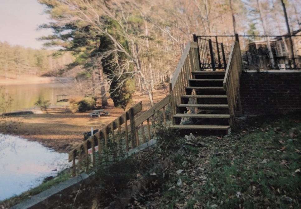 two staircases leading from deck to lake